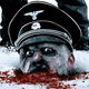 Illustration for article titled Zombie Nazi And Alien Fighting Viking Poster Close Ups